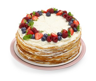 Photo of Delicious crepe cake with fresh berries isolated on white
