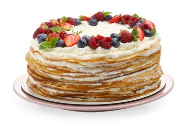 Photo of Delicious crepe cake with fresh berries isolated on white