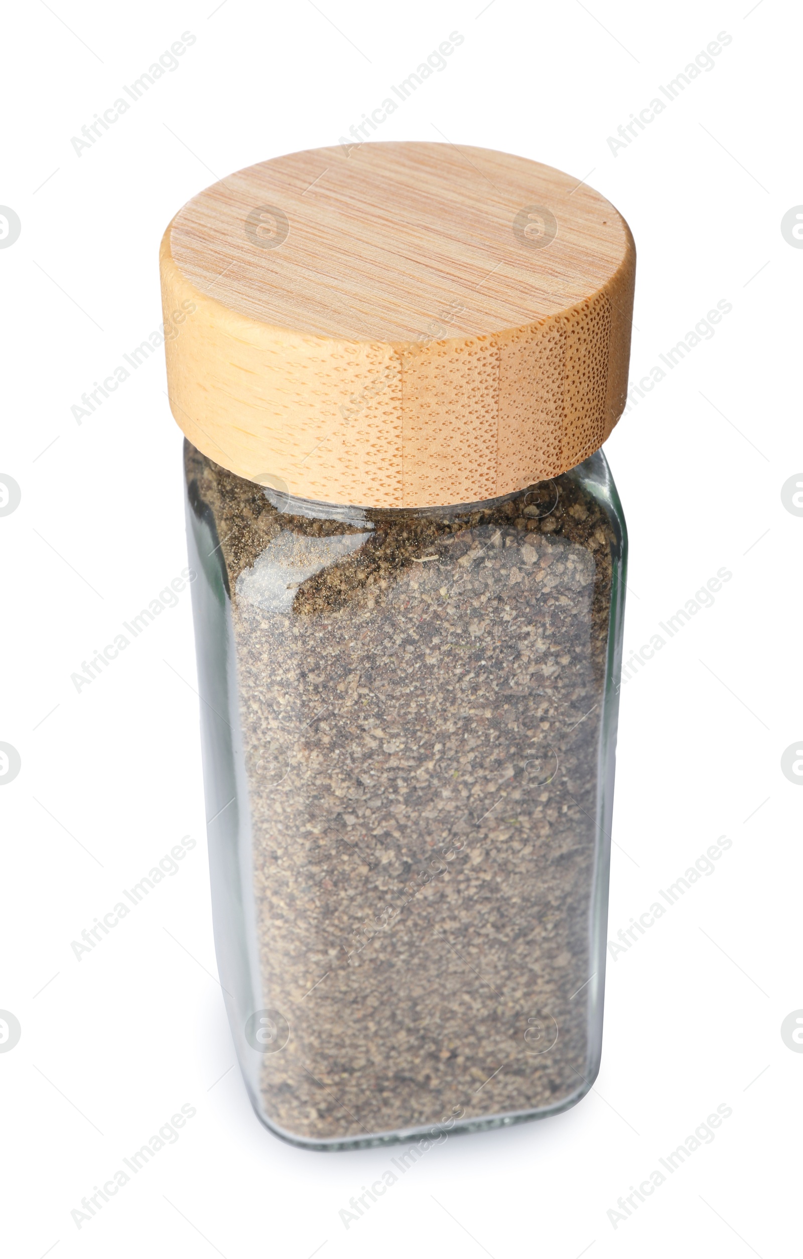 Photo of Ground black pepper in glass jar isolated on white. Aromatic spice