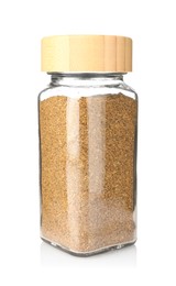 Photo of Ground caraway (Persian cumin) in glass jar isolated on white. Aromatic spice
