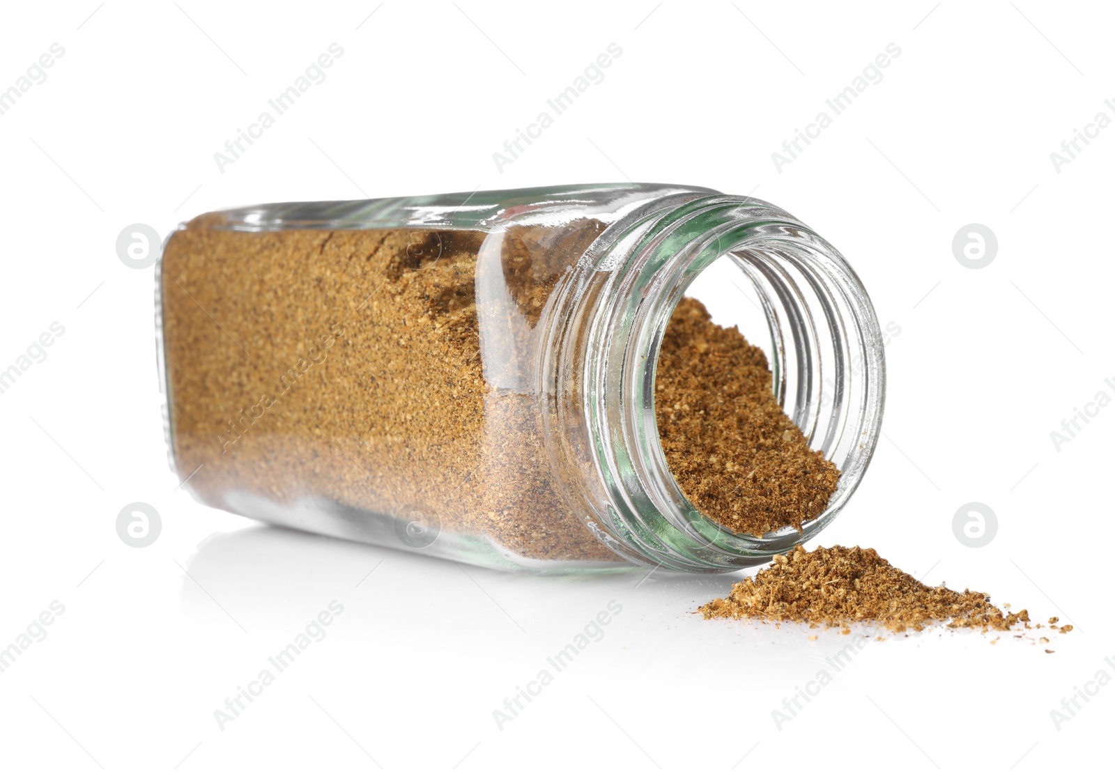 Photo of Ground caraway (Persian cumin) in glass jar isolated on white. Aromatic spice