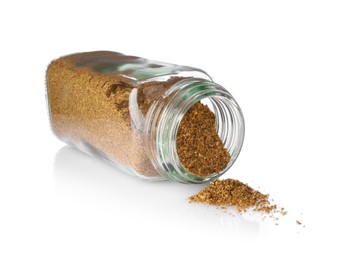 Photo of Ground caraway (Persian cumin) in glass jar isolated on white. Aromatic spice