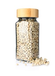 Photo of Peppercorns in glass jar isolated on white. Aromatic spice