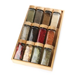 Photo of Different aromatic spices in glass jars isolated on white, above view