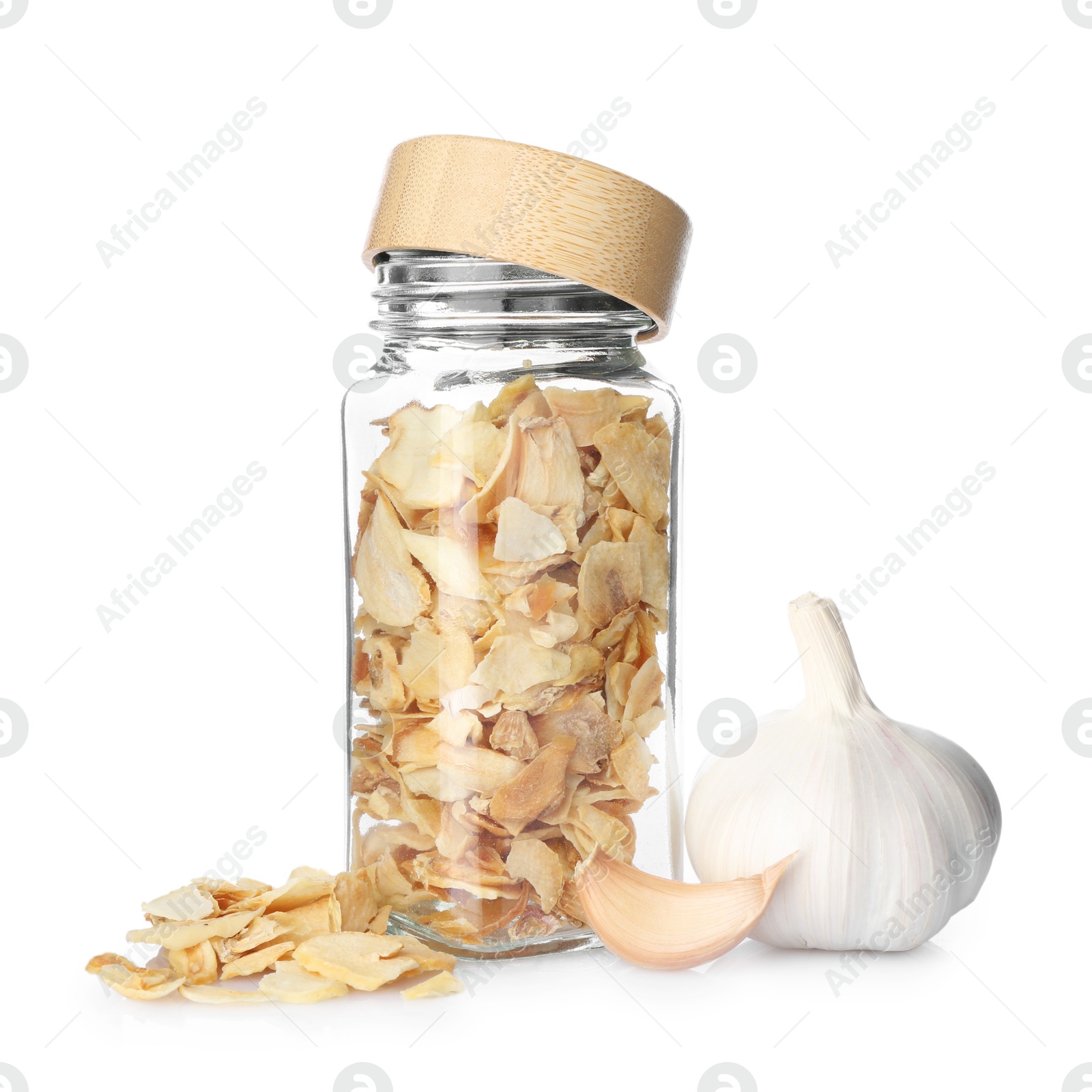 Photo of Fresh and dried garlic isolated on white