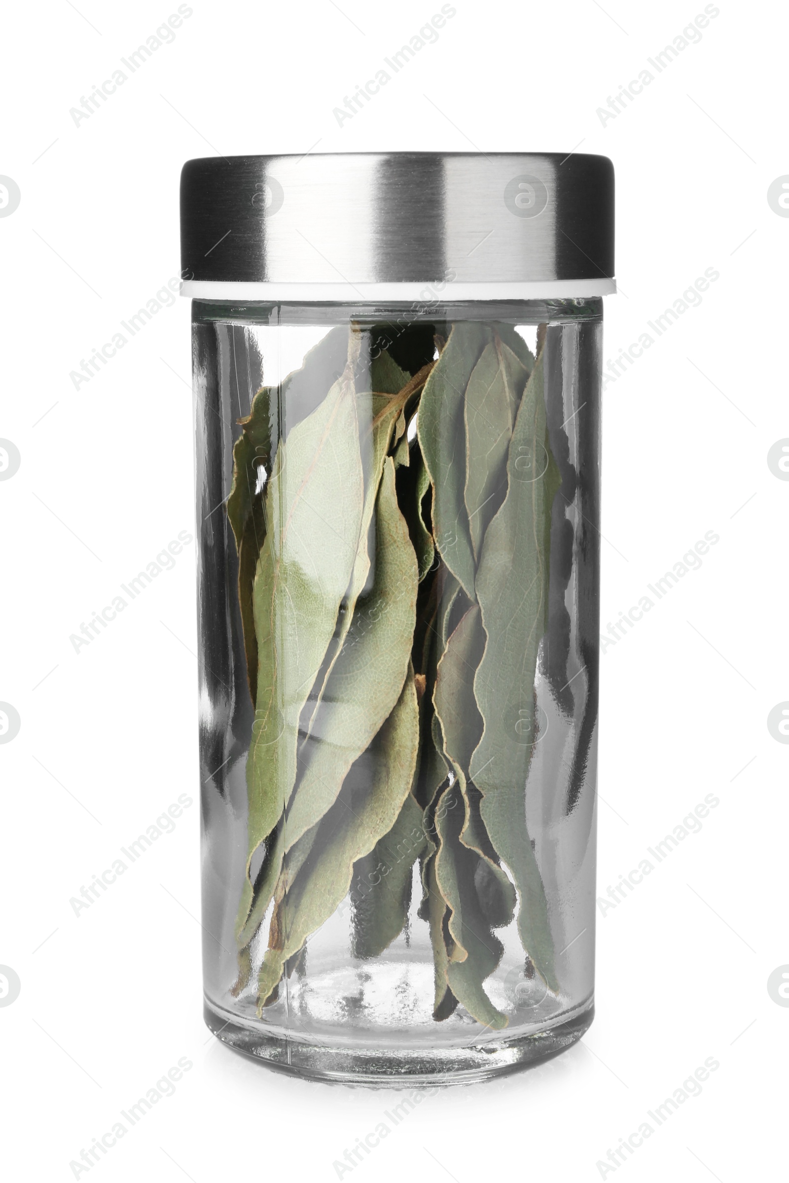 Dried bay leaves in spice jar isolated on white Photo of Dried bay leaves in spice jar isolated on white