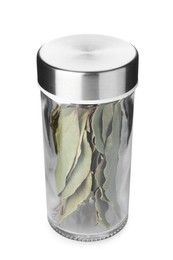 Photo of Dried bay leaves in spice jar isolated on white