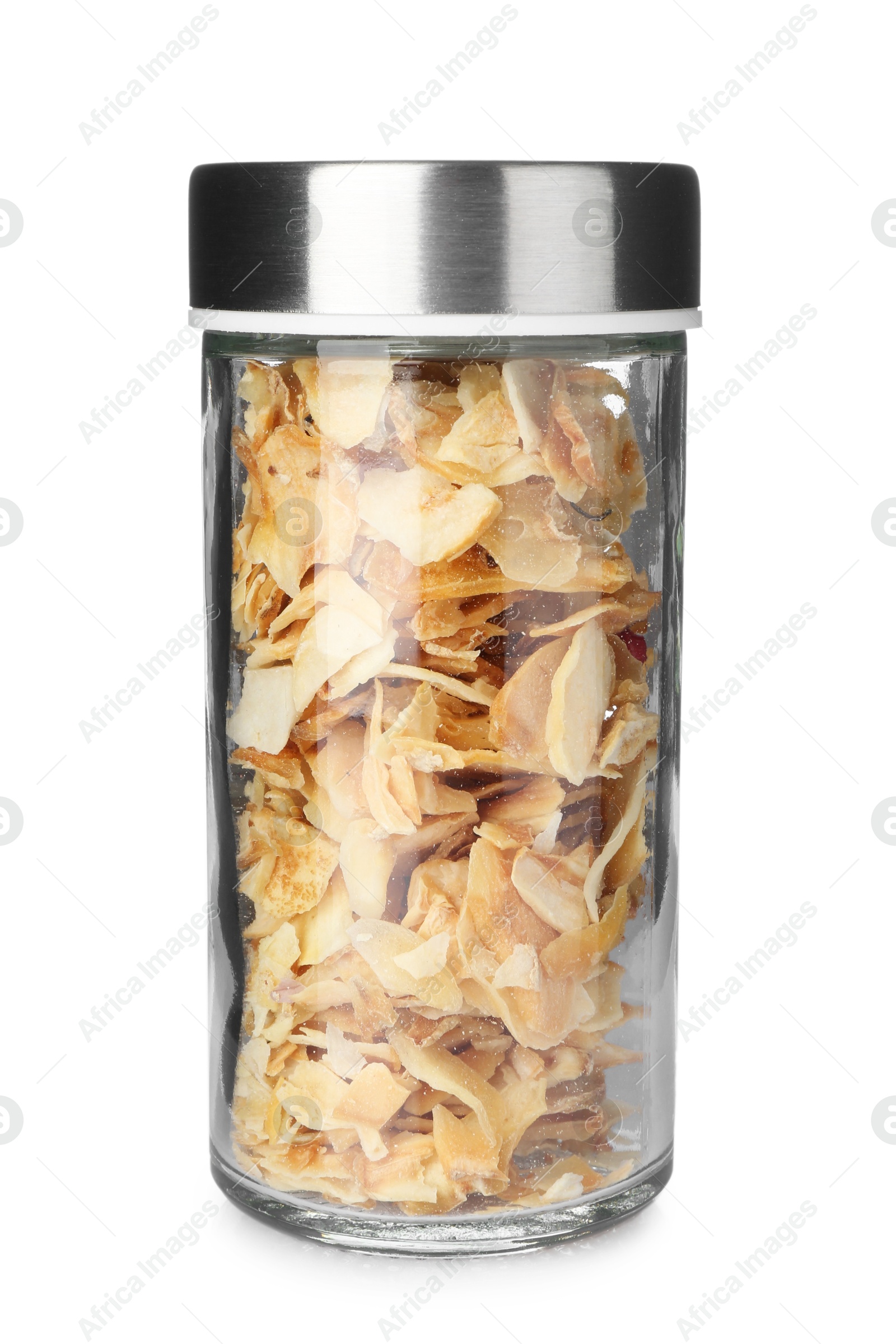 Photo of Dried garlic flakes in spice jar isolated on white