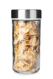 Photo of Dried garlic flakes in spice jar isolated on white