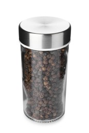 Photo of Black peppercorns in spice jar isolated on white
