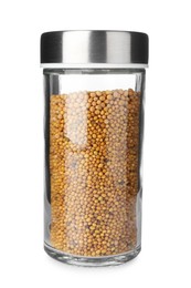 Photo of Mustard seeds in spice jar isolated on white