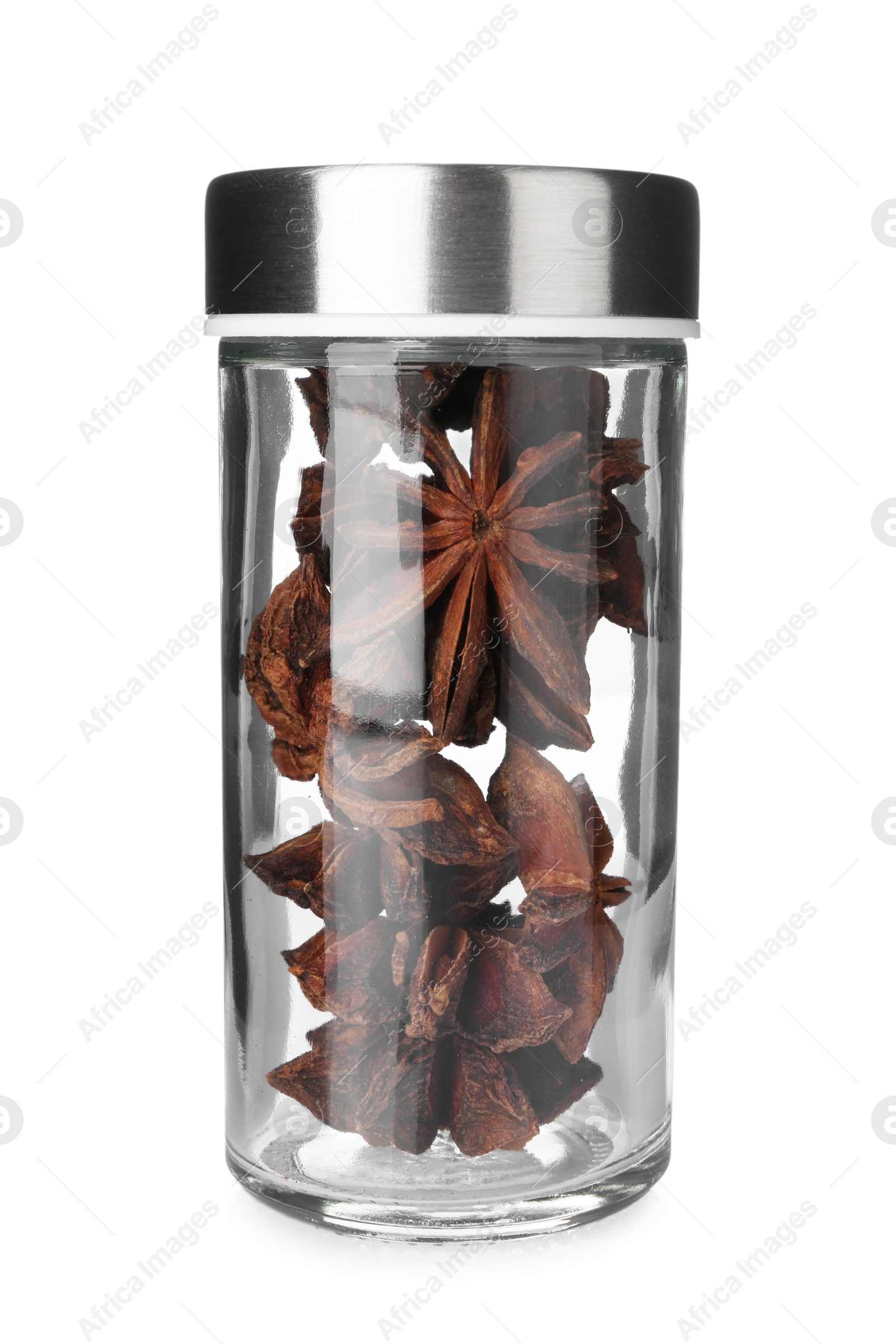Photo of Anise stars in spice jar isolated on white