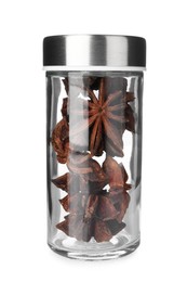 Photo of Anise stars in spice jar isolated on white