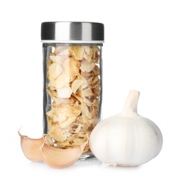Photo of Fresh and dried garlic isolated on white