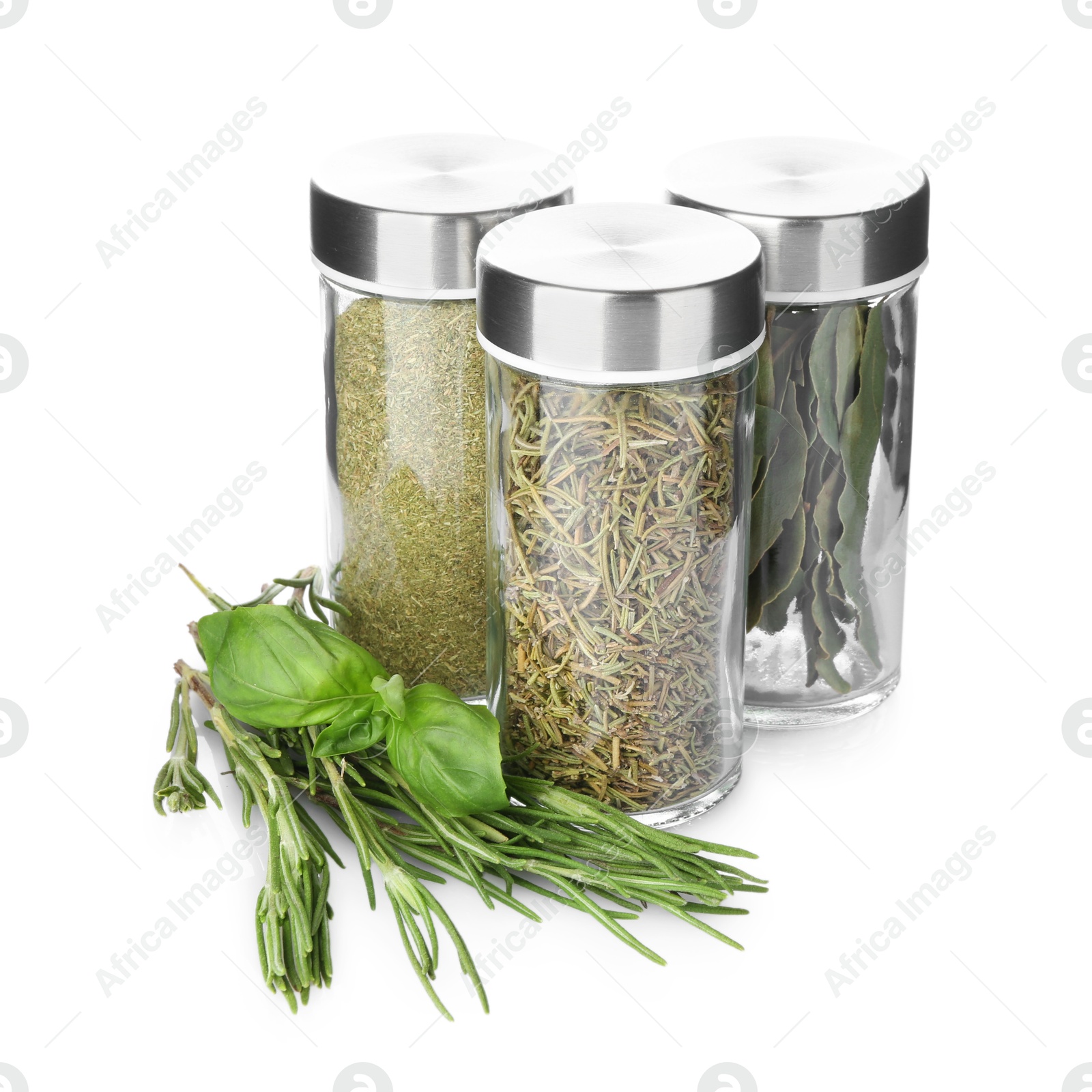 Photo of Many different aromatic spices in jars isolated on white