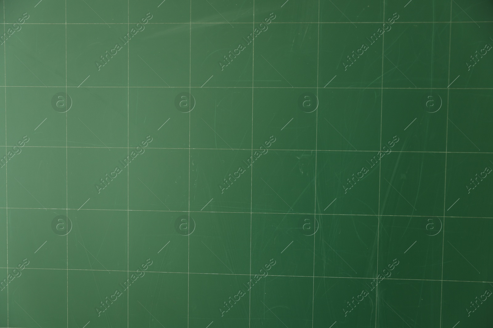 Photo of Blank green chalkboard as background, closeup view