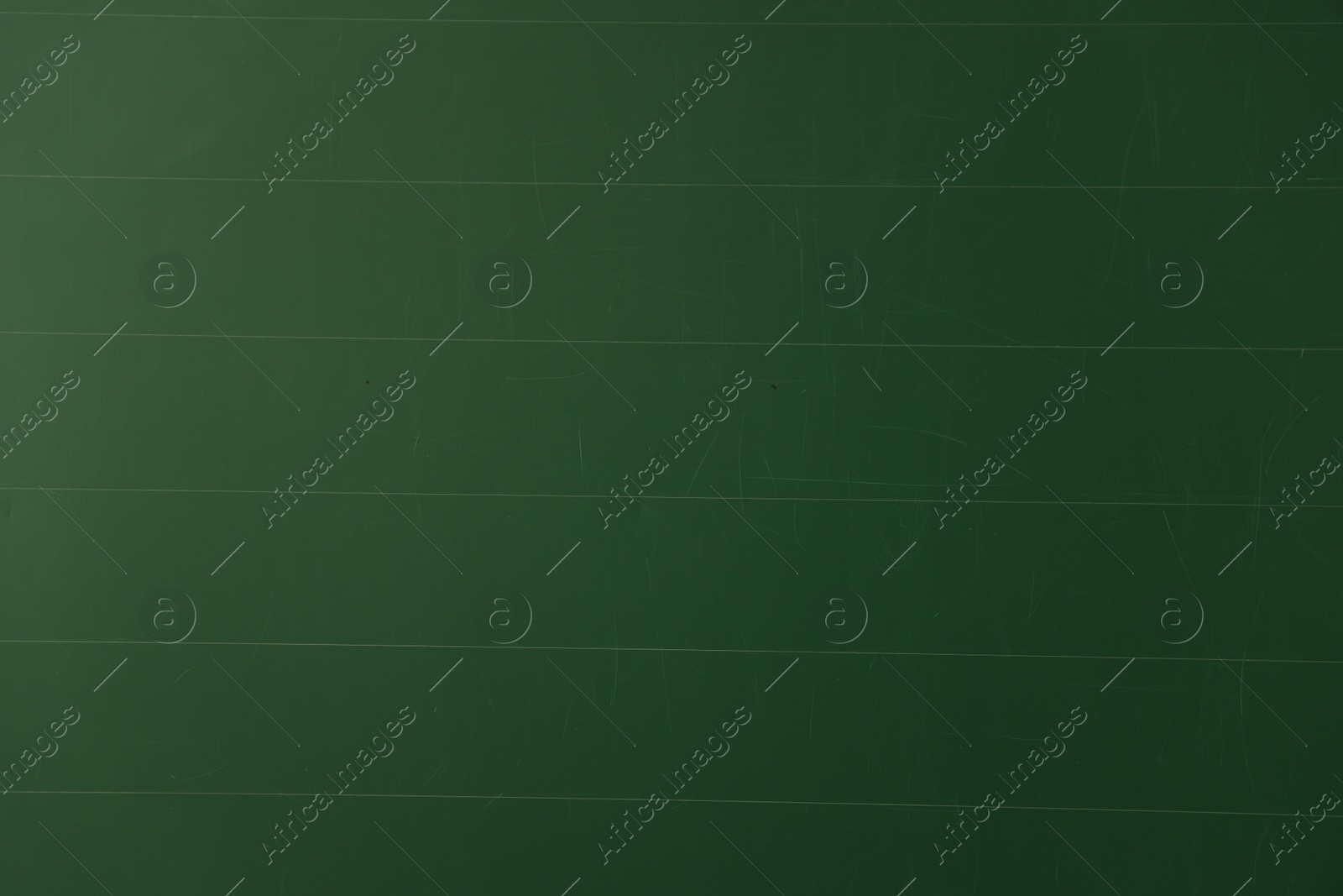 Photo of Blank green chalkboard as background, closeup view