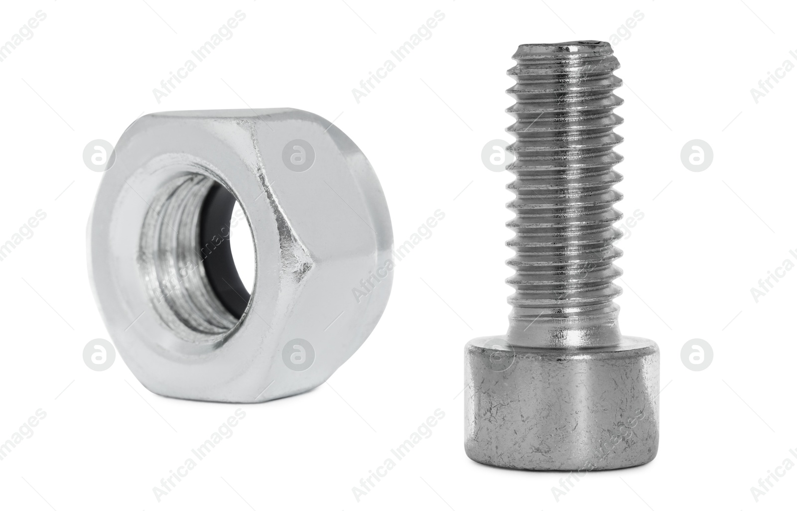 Image of Metal hex nut and socket bolt isolated on white
