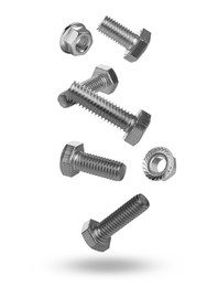 Image of Metal nuts and bolts falling against white background