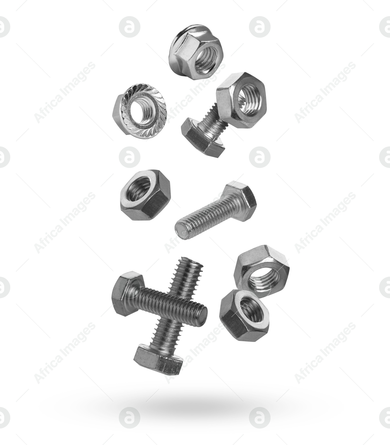 Image of Metal nuts and bolts falling against white background