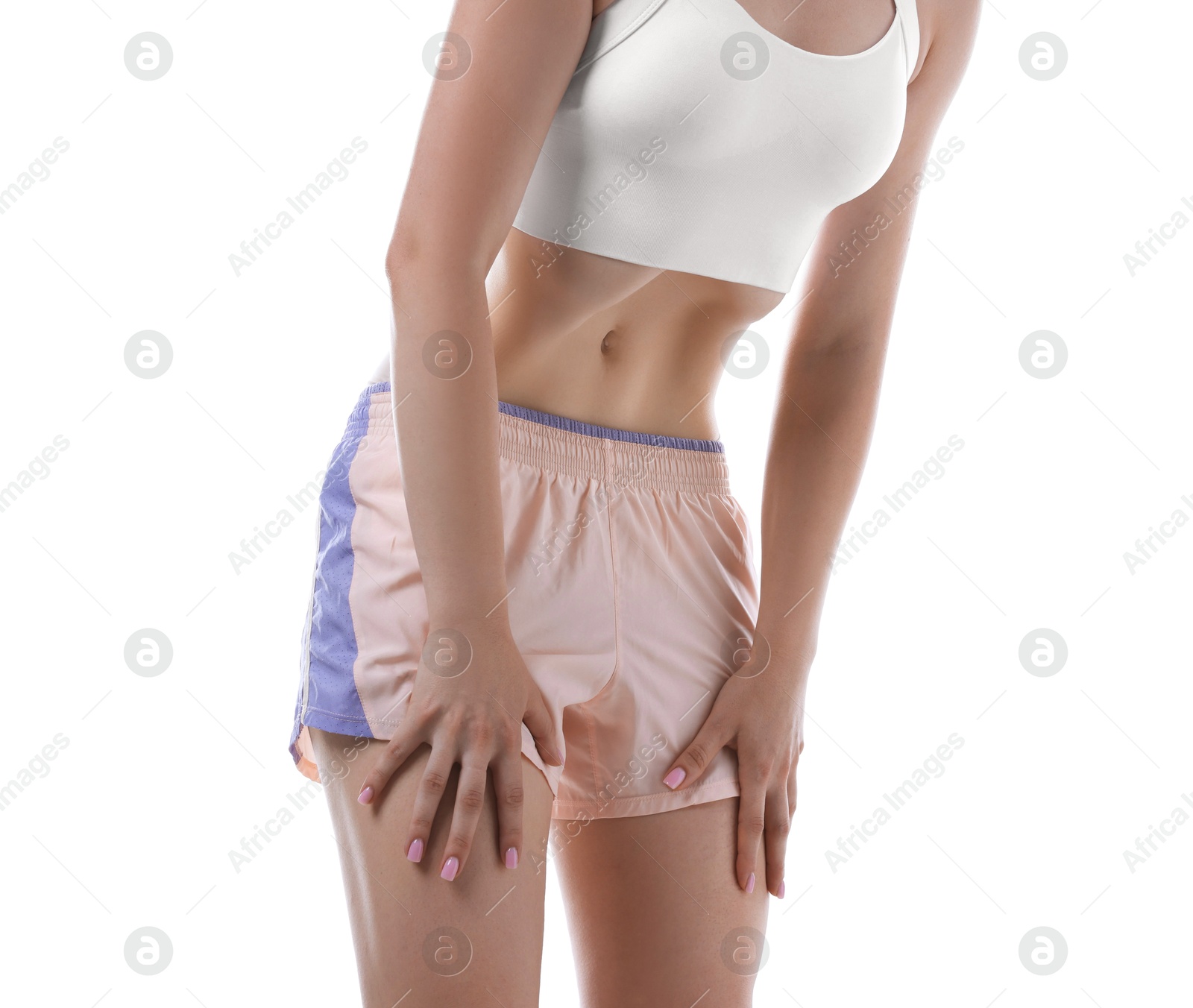 Woman doing abdominal vacuum exercise on white background, closeup Photo of Woman doing abdominal vacuum exercise on white background, closeup