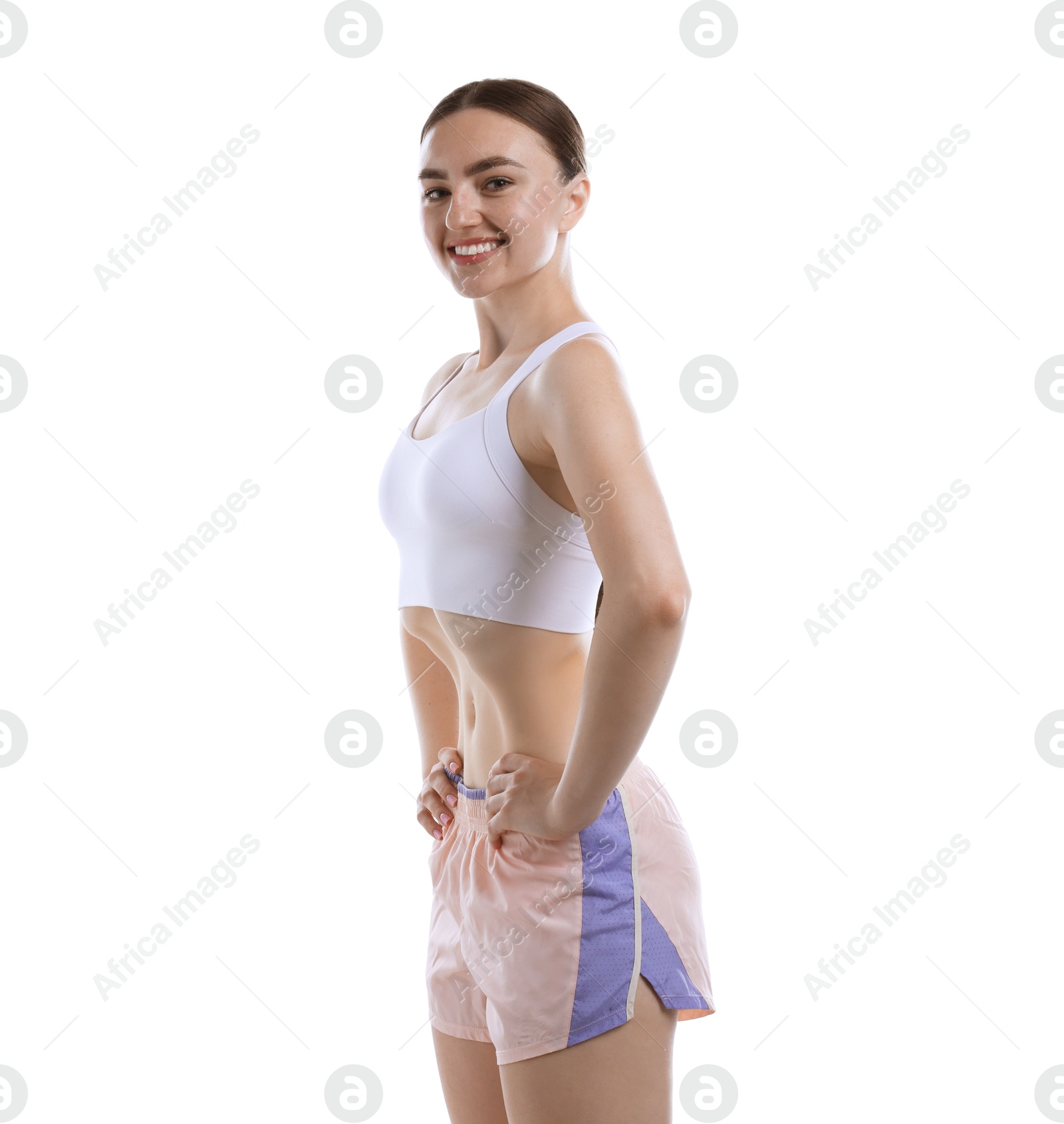 Happy woman doing abdominal vacuum exercise on white background Photo of Happy woman doing abdominal vacuum exercise on white background