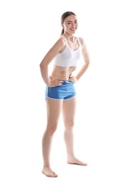 Photo of Happy woman doing abdominal vacuum exercise on white background