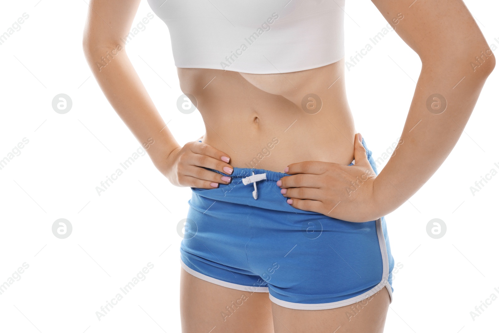 Woman doing abdominal vacuum exercise on white background, closeup Photo of Woman doing abdominal vacuum exercise on white background, closeup