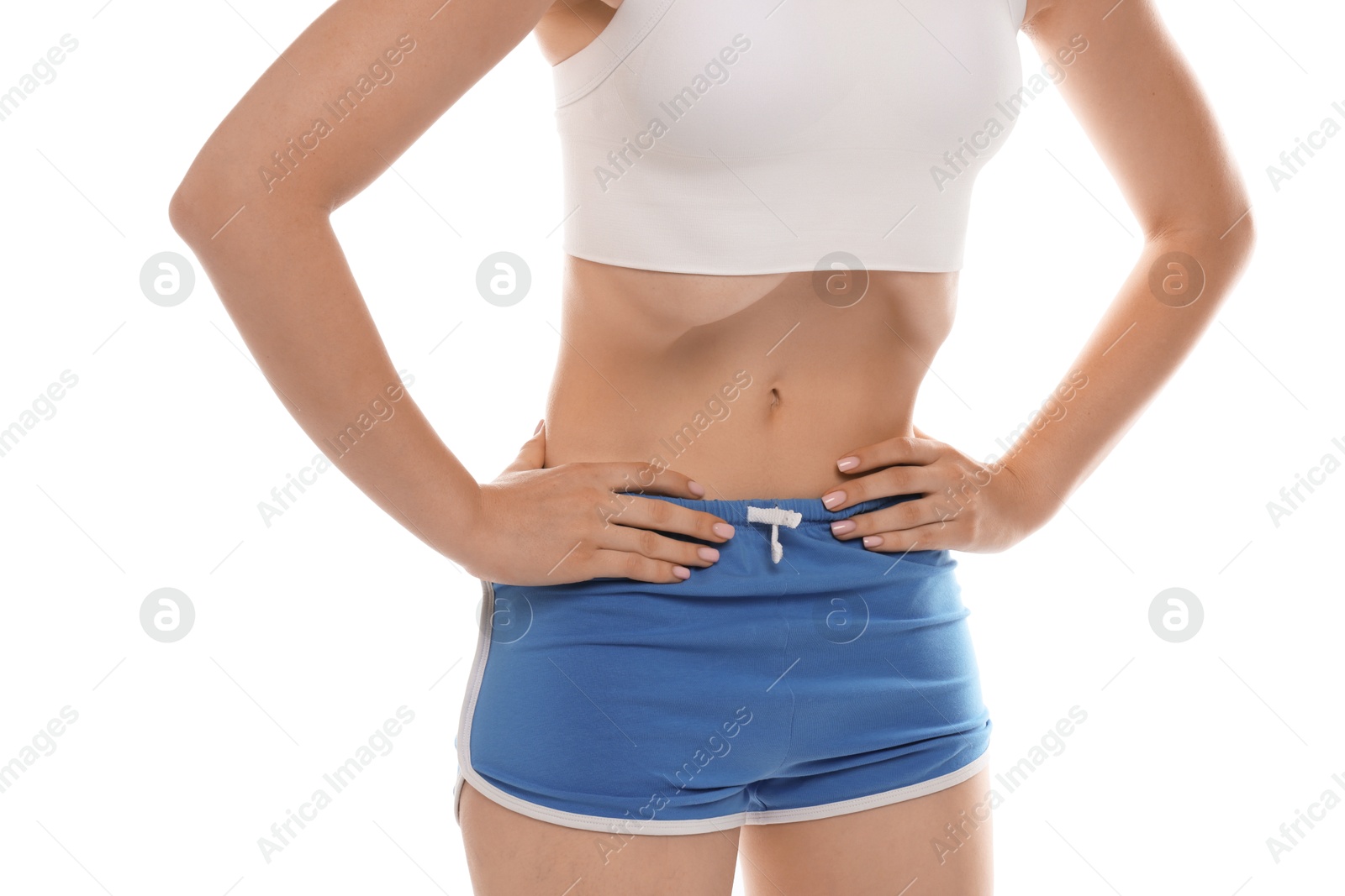 Woman doing abdominal vacuum exercise on white background, closeup Photo of Woman doing abdominal vacuum exercise on white background, closeup