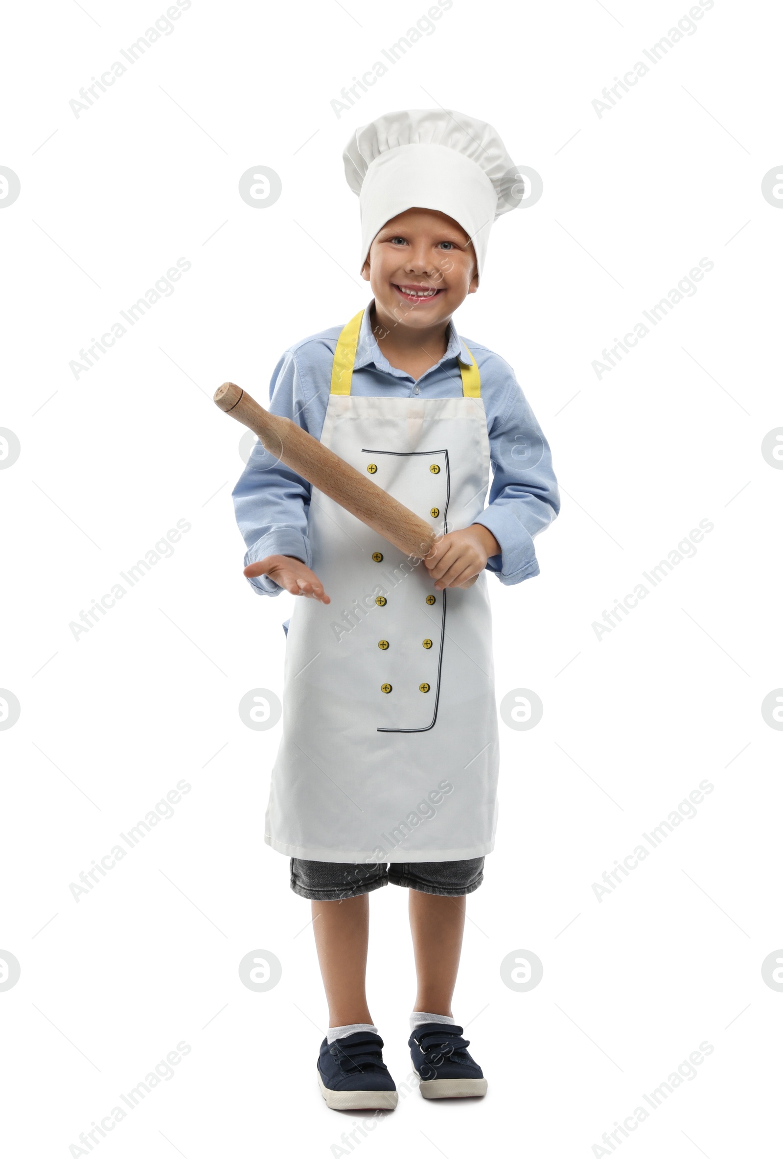 Photo of Choice of profession. Little boy with rolling pin pretending to be chef on white background