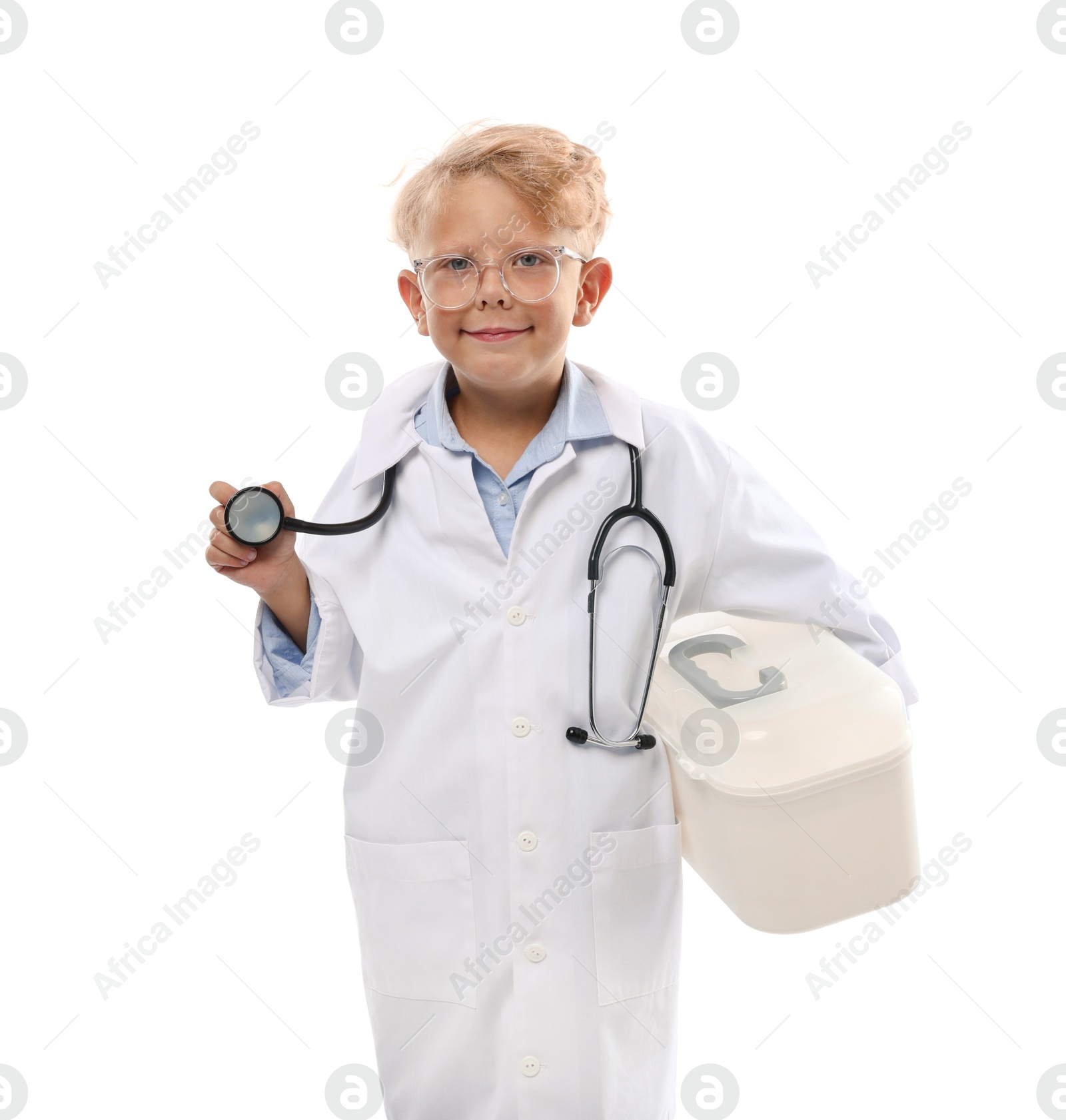 Photo of Choice of profession. Little boy with stethoscope and case pretending to be doctor on white background