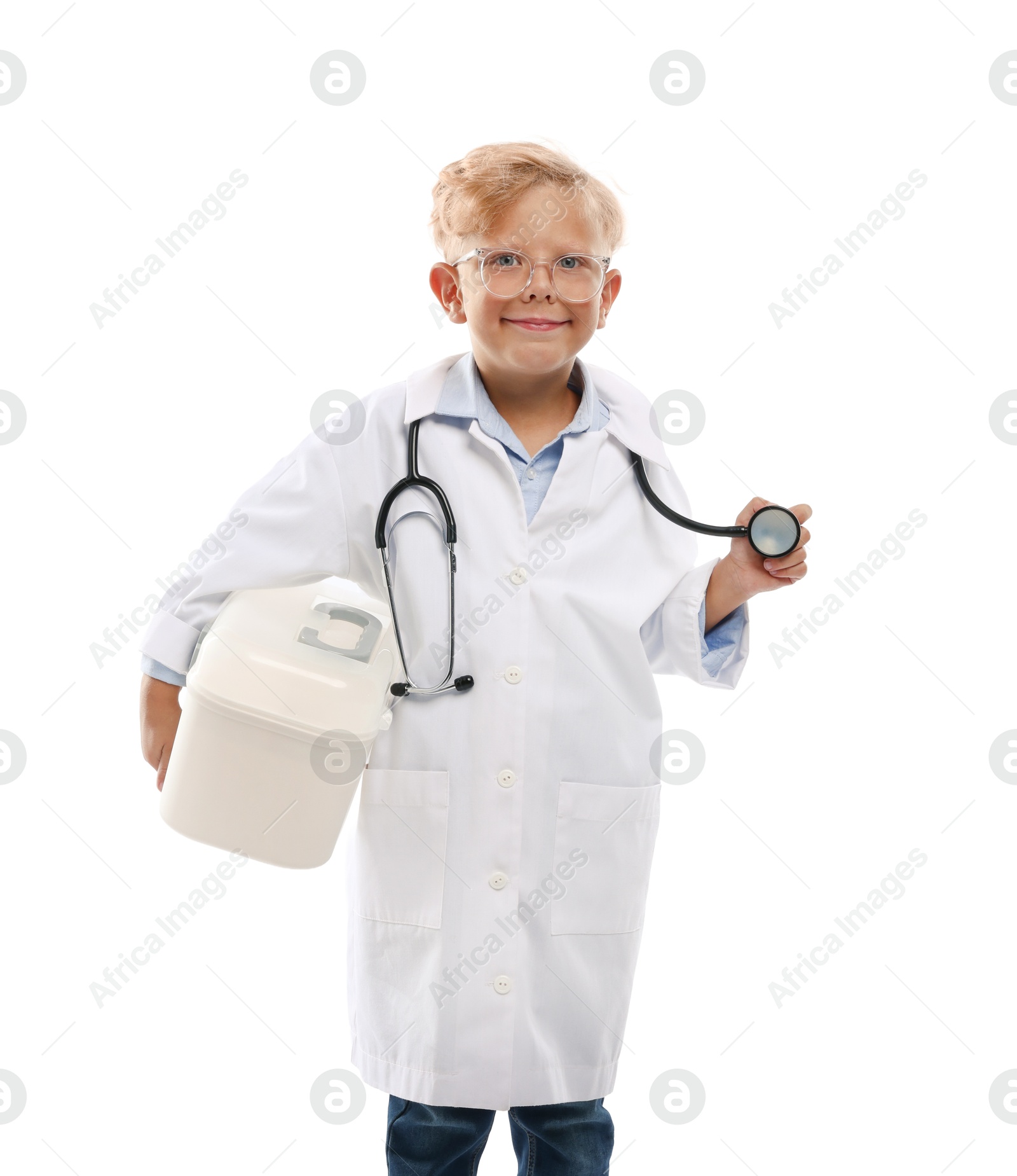 Photo of Choice of profession. Little boy with stethoscope and case pretending to be doctor on white background