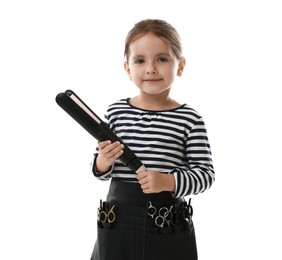 Photo of Choice of profession. Cute little girl with straightener and tools pretending to be hairdresser on white background