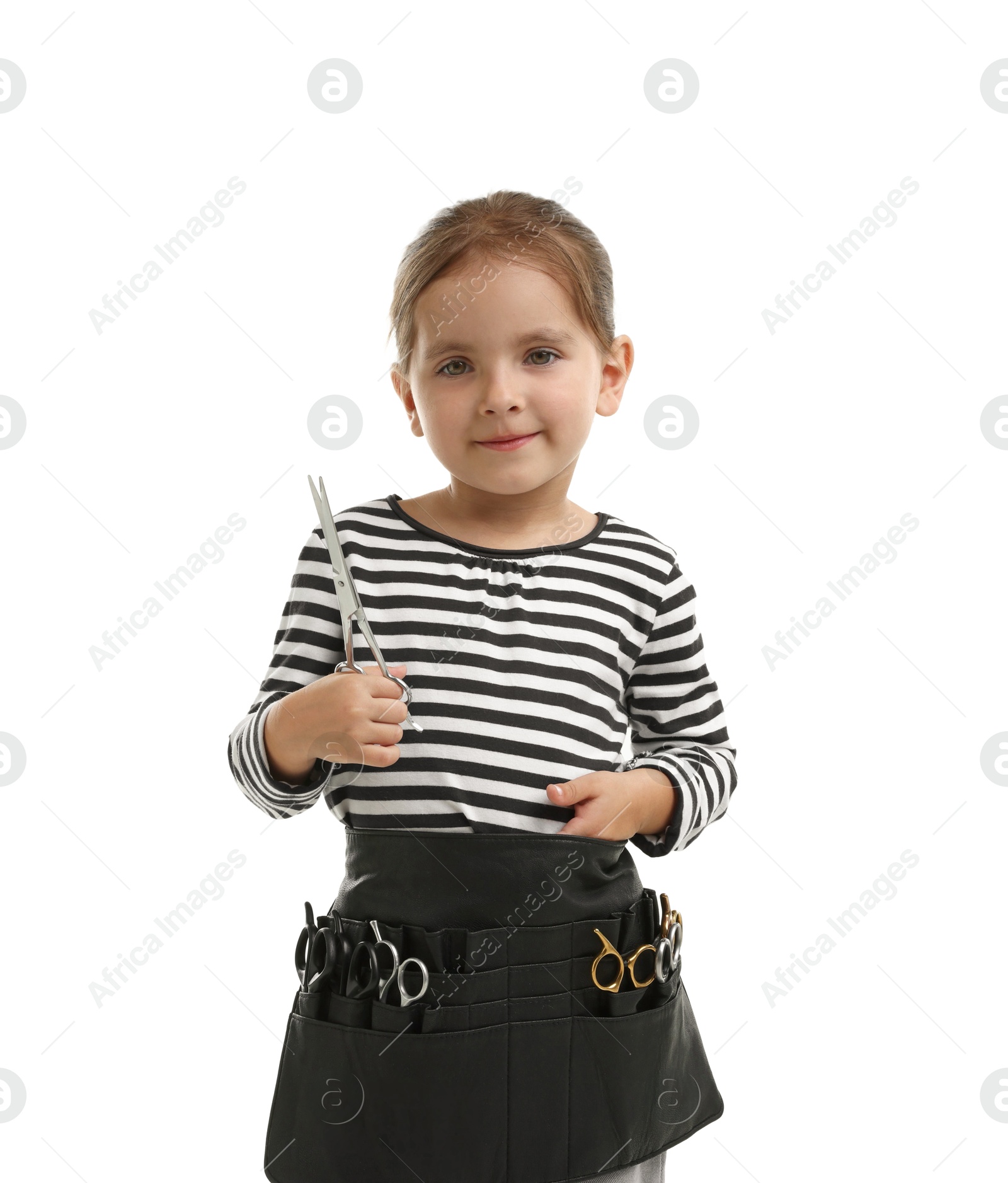 Photo of Choice of profession. Cute little girl with tools pretending to be hairdresser on white background