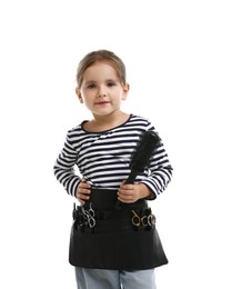 Photo of Choice of profession. Cute little girl with tools pretending to be hairdresser on white background