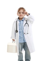 Photo of Choice of profession. Little girl in uniform with stethoscope and case pretending to be doctor on white background