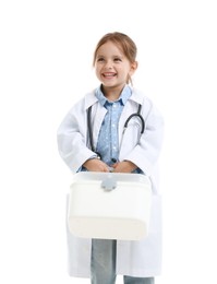 Photo of Choice of profession. Little girl in uniform with stethoscope and case pretending to be doctor on white background