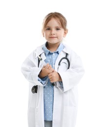 Photo of Choice of profession. Little girl in uniform with stethoscope and syringe pretending to be doctor on white background