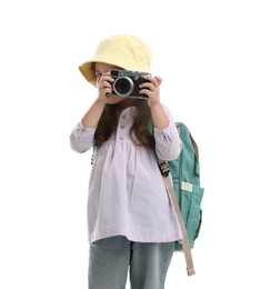 Photo of Choice of profession. Little girl with camera pretending to be photographer on white background