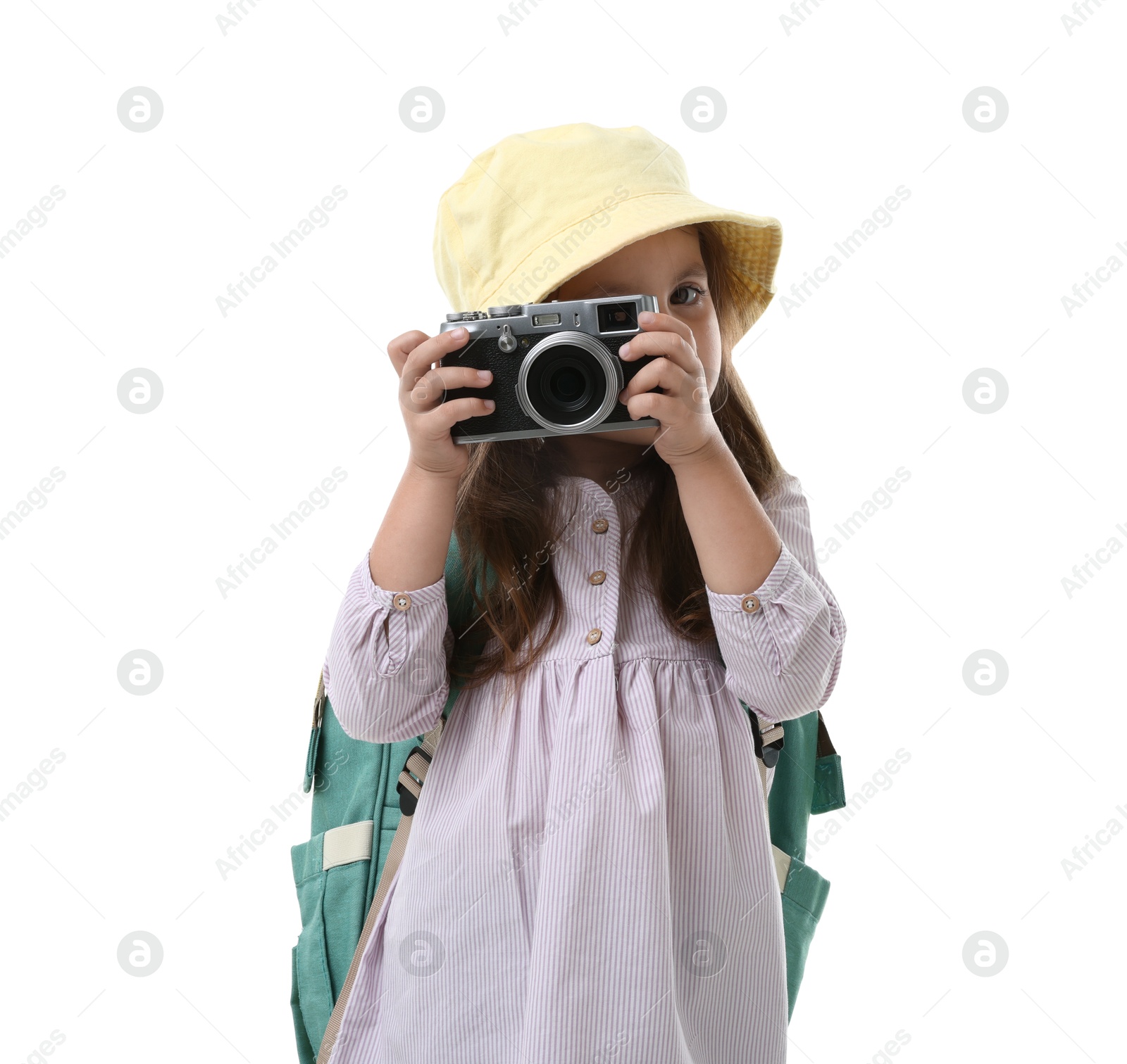 Photo of Choice of profession. Little girl with camera pretending to be photographer on white background