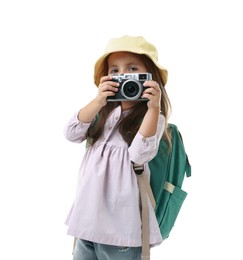 Photo of Choice of profession. Little girl with camera pretending to be photographer on white background