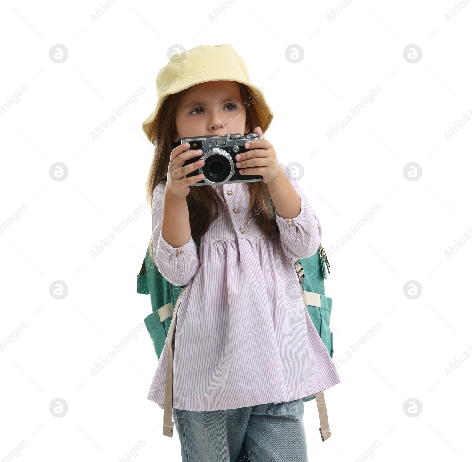 Photo of Choice of profession. Little girl with camera pretending to be photographer on white background