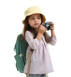 Photo of Choice of profession. Little girl with camera pretending to be photographer on white background