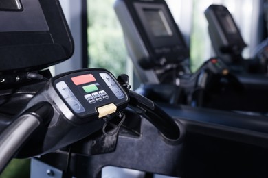 Photo of Many modern in gym, closeup. Healthy lifestyle