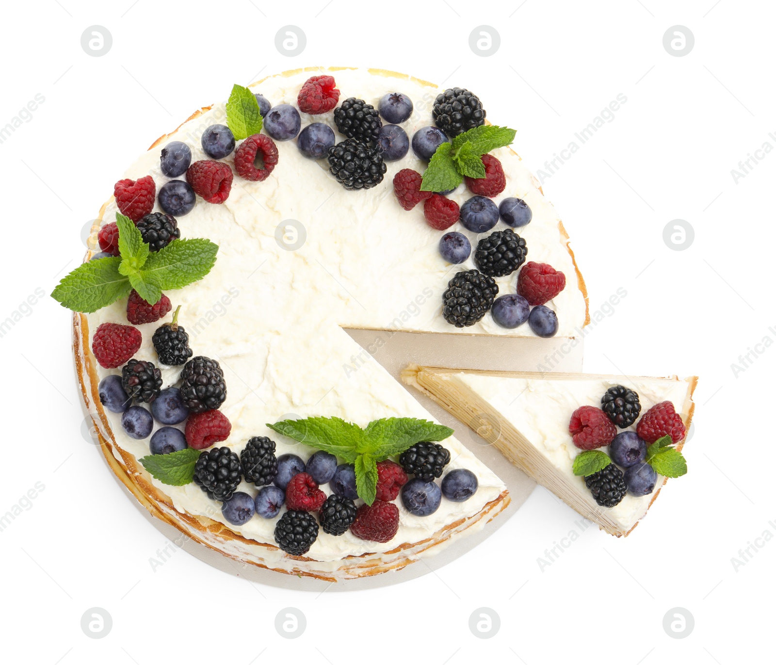 Photo of Tasty crepe cake with berries and mint isolated on white, top view