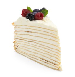 Photo of Piece of tasty crepe cake with berries and mint isolated on white