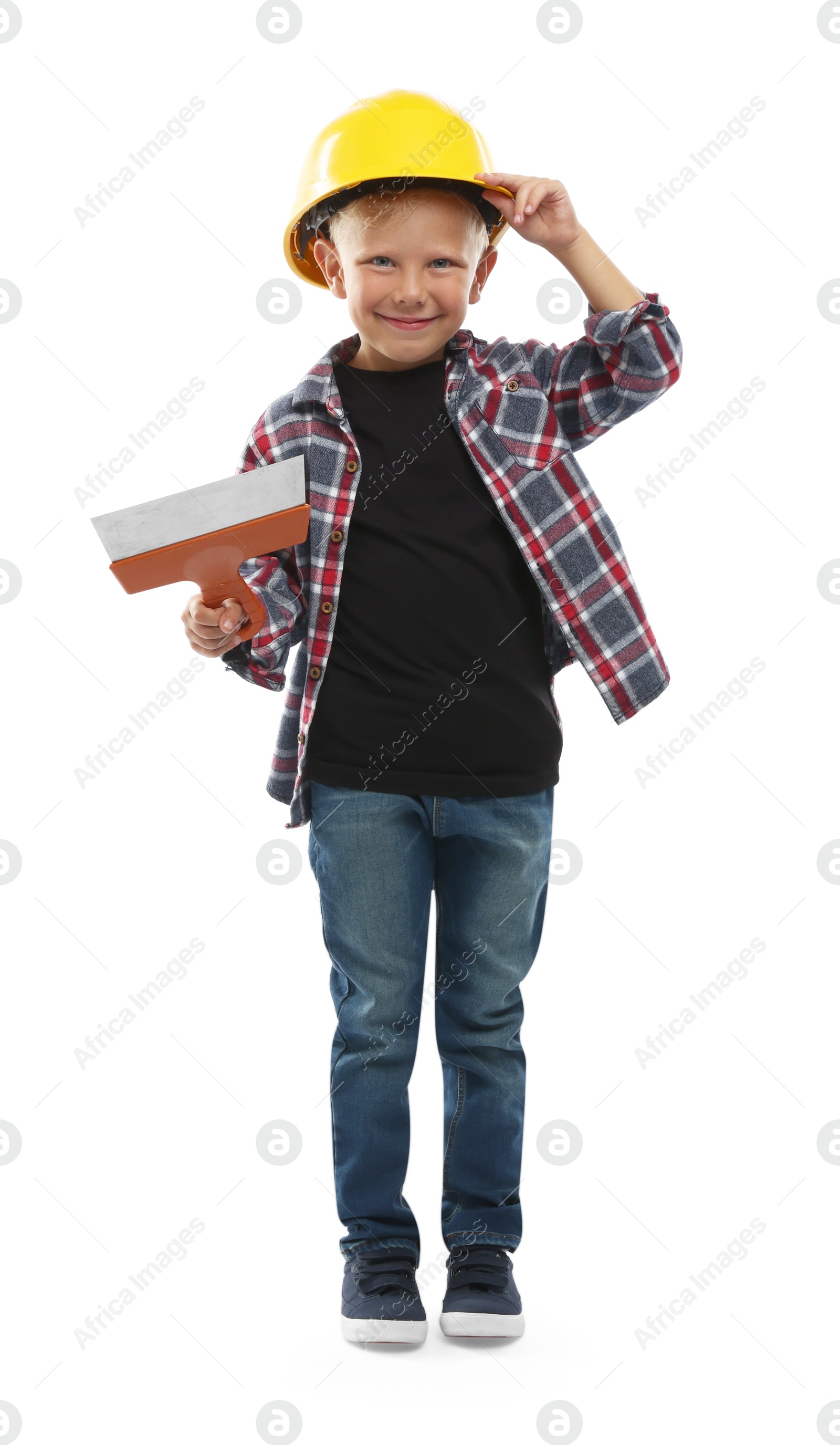 Photo of Choice of profession. Little boy with spatula pretending to be builder on white background