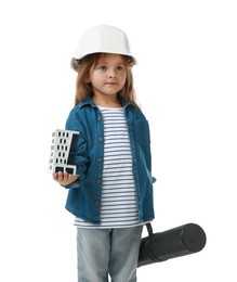 Photo of Choice of profession. Little girl in hardhat with building model and drawing tube pretending to be architect on white background