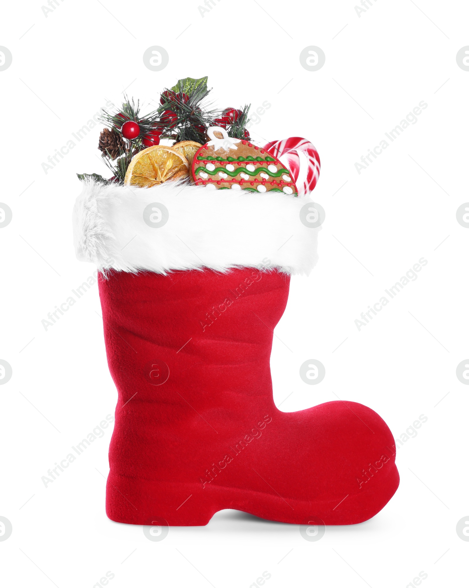 Happy Saint Nicholas day. Red boot with sweets and festive decor isolated on white Photo of Happy Saint Nicholas day. Red boot with sweets and festive decor isolated on white