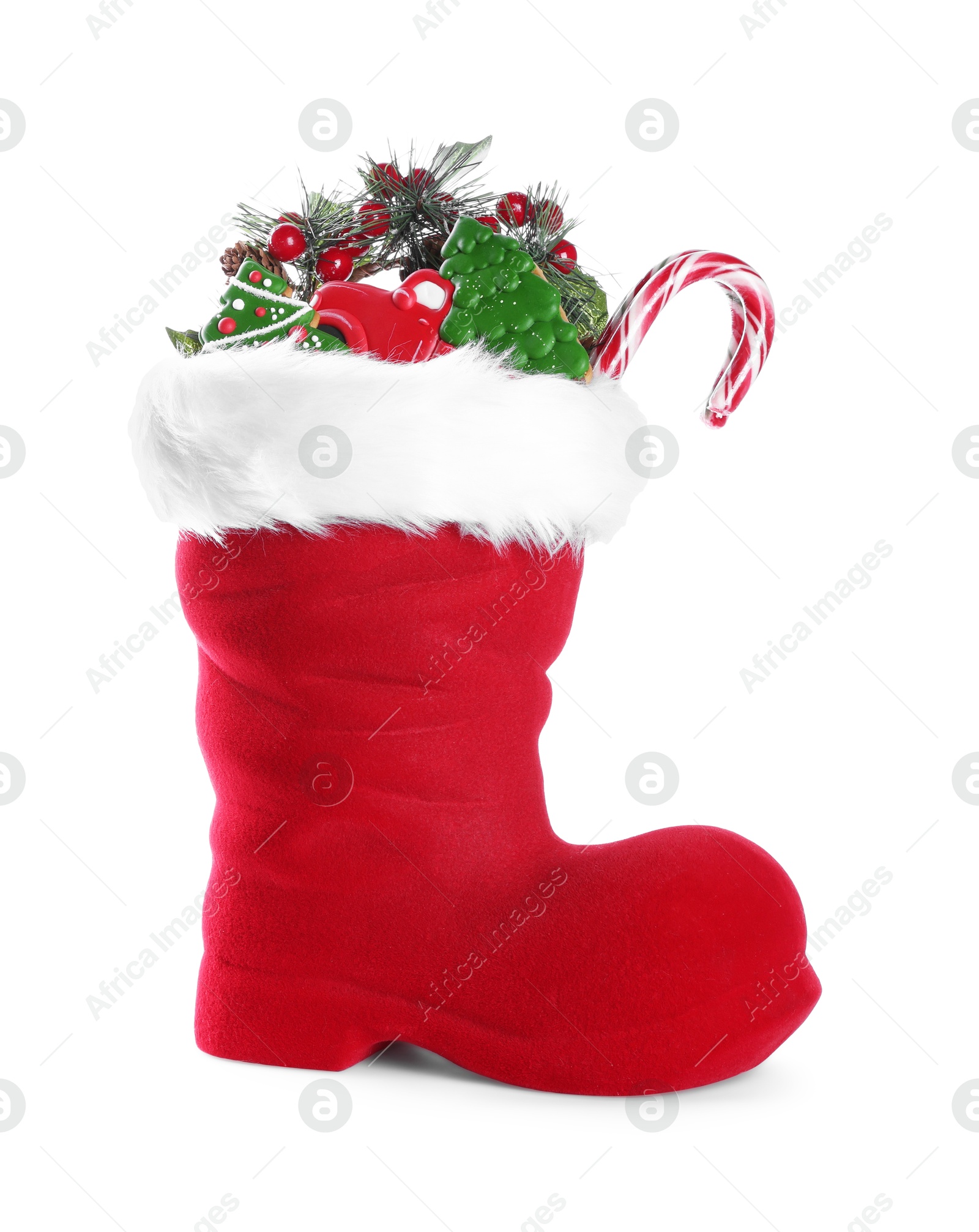 Happy Saint Nicholas day. Red boot with sweets and festive decor isolated on white Photo of Happy Saint Nicholas day. Red boot with sweets and festive decor isolated on white